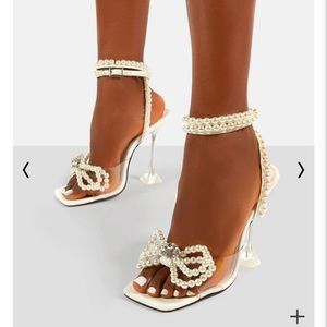 GLIMMER WHITE WRAP AROUND PEARL DETAIL BOW SQUARE TOE CAKE STAND HEELS